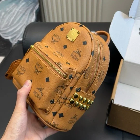 MCM | Bags | Mcm Mini Cognac Visetos Mini Backpack | Poshmark display picture 1